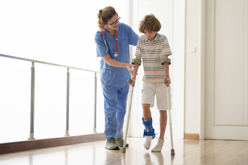 Injured child on crutches